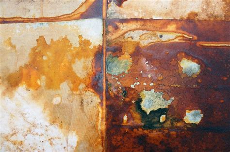 rusty metal objects on fabric|rust dye material.